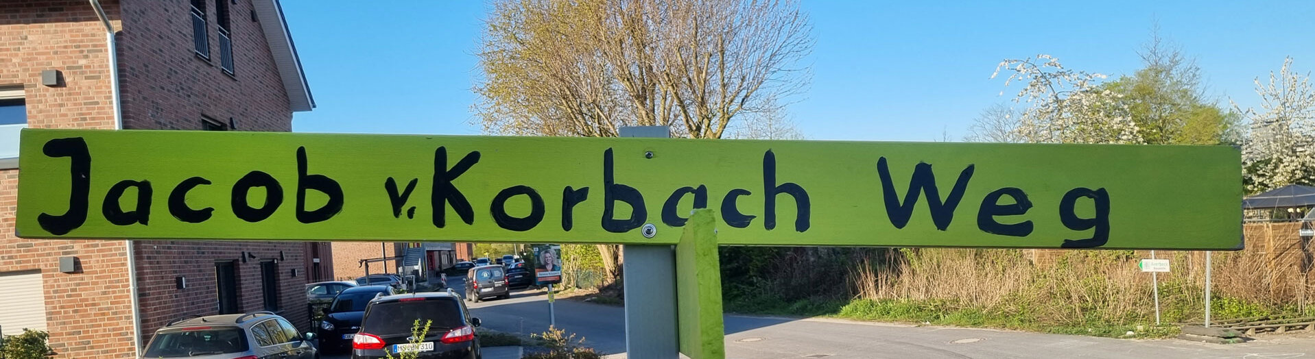 Provisorisches Straßenschild (April 2022) am Jacob-von-Korbach-Weg im Neubaugebiet in Münster-Wolbeck